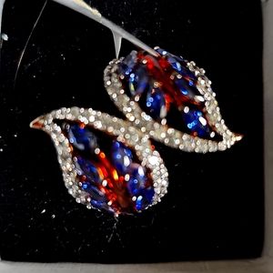 Bella Luce Tanzanite and white diamond stimulants rose ring.